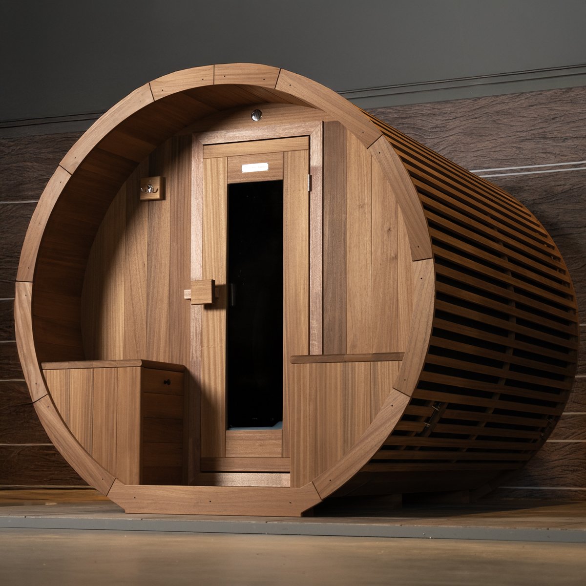 Modern barrel sauna from Happy Timber, made from sustainable Thermo Ayous wood. Modern barrel sauna from Happy Timber, made from sustainable Thermo Ayous wood.